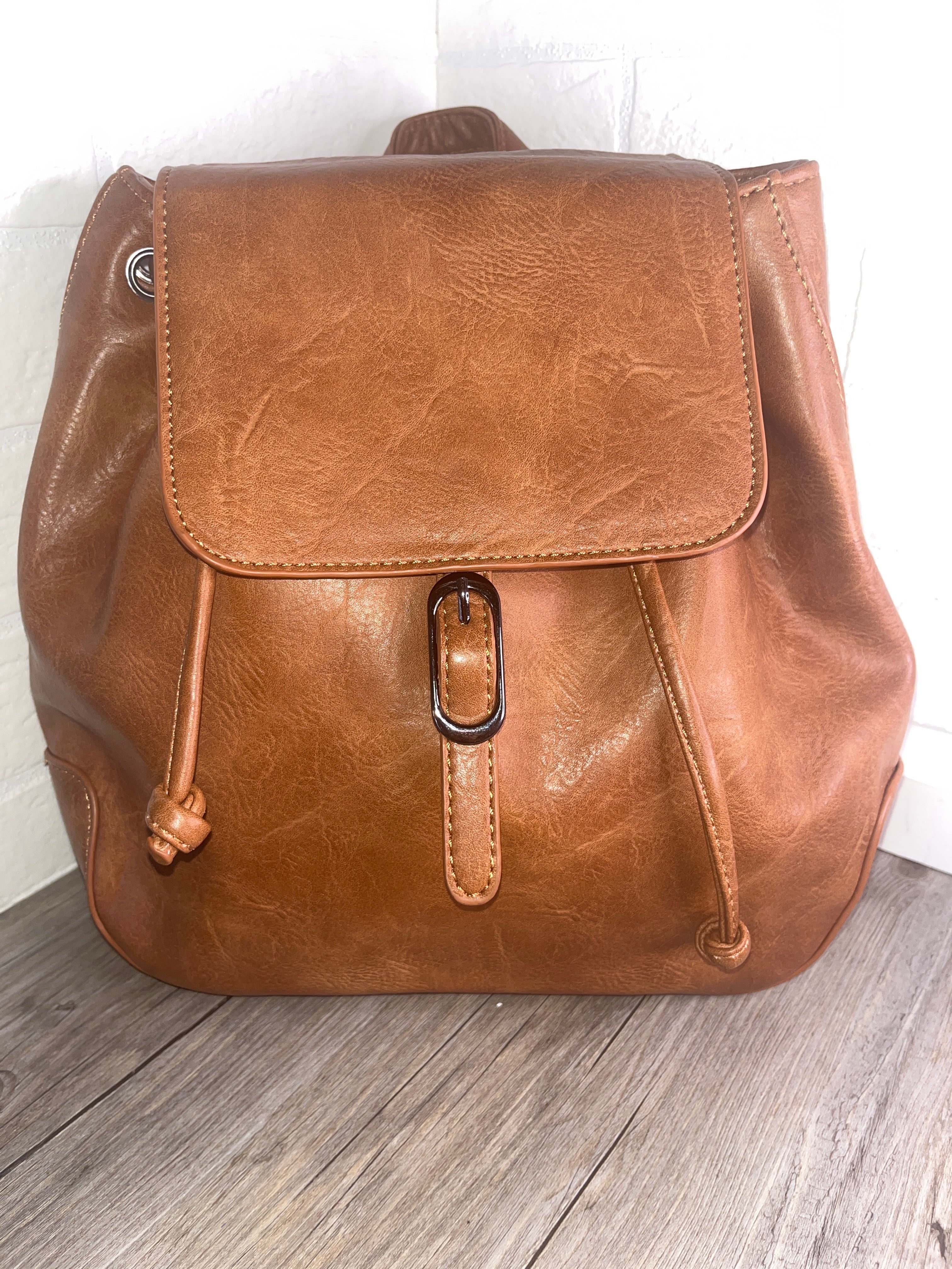Mochila raíz marrón