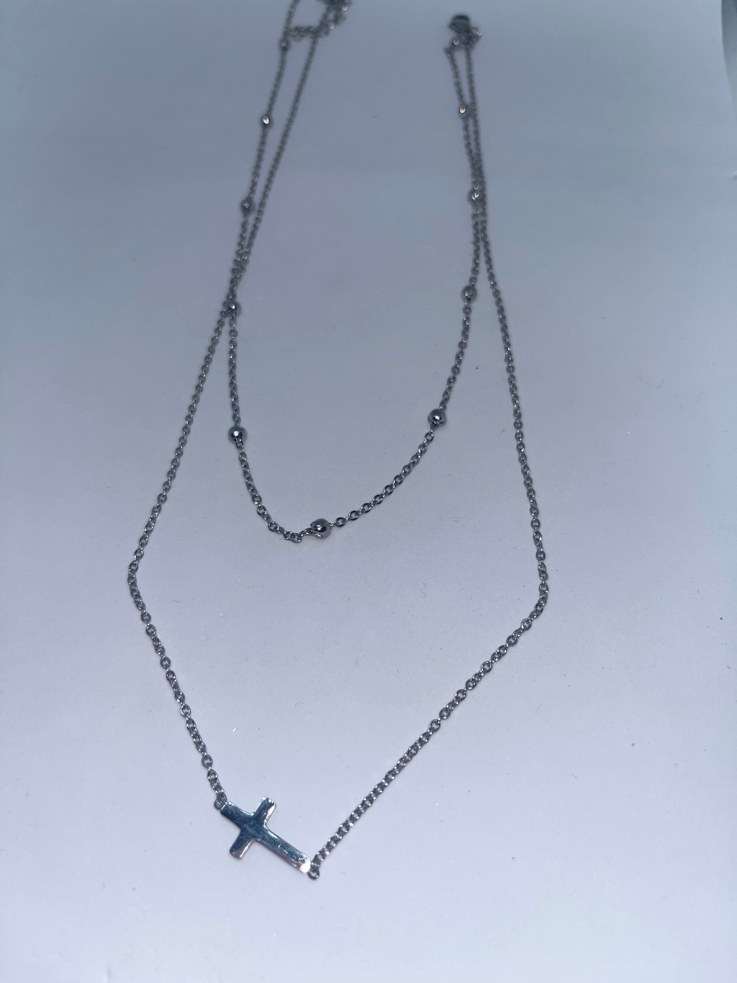 Collar doble cruz